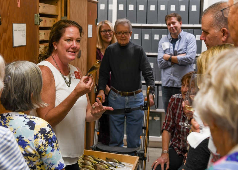 Dr. Fahy showing a study skin to a multigenerational group in the VZ collection